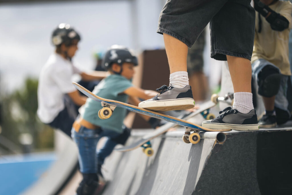 skater attempting trick rail